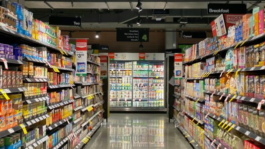 white and red labeled pack on white shelf